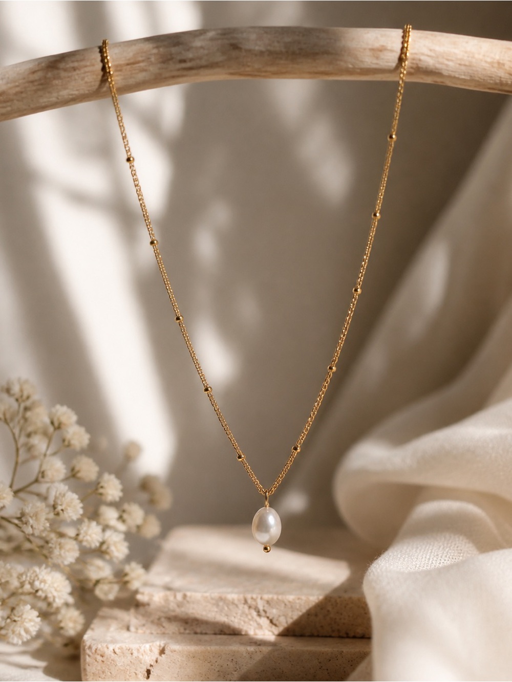 PEARL DROP TIDE NECKLACE